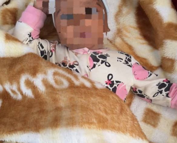 rescued two-month-old baby in Ikot Abasi